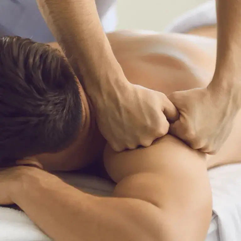 Therapeutic massage on the shoulders